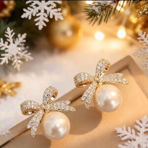 Elegant Gold and Pearl Bow Earrings